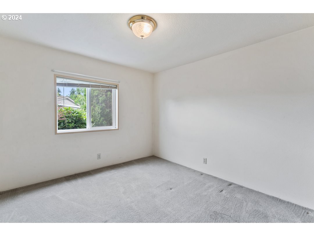 2150 Laura Street, Unit 212 Springfield, OR 97477 - Photo 17 of 37 an empty room with a window