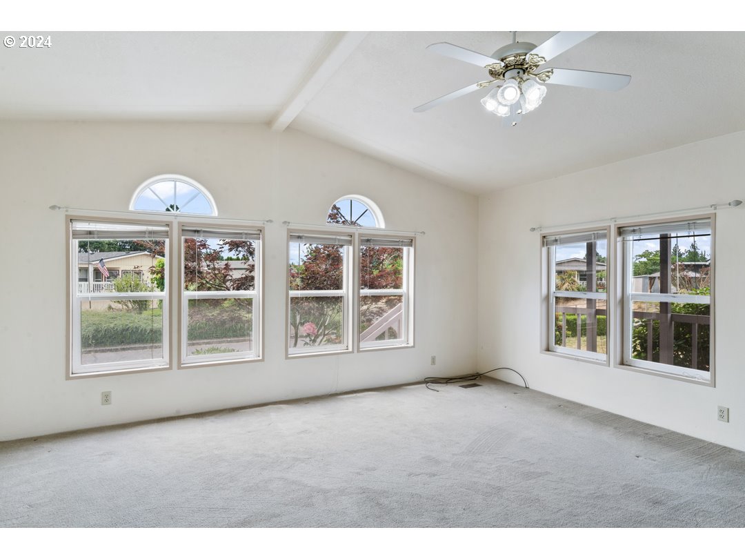 2150 Laura Street, Unit 212 Springfield, OR 97477 - Photo 5 of 37 a view of an empty room with a window