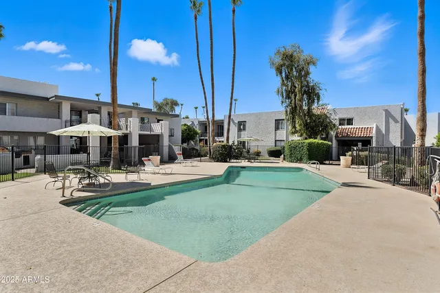 a view of a house with sitting area and furniture