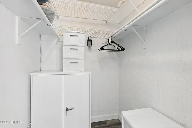 a view of a bathroom with a wooden floor