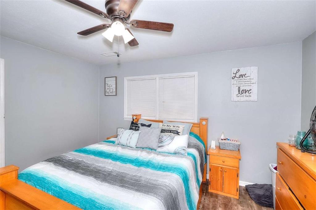 4455 Jersey Walnut Grove Road Covington, GA 30014 - Photo 13 of 28 a bedroom with bed and window