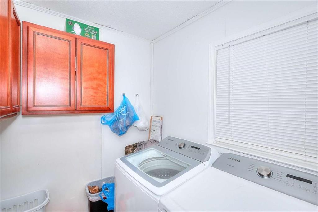 4455 Jersey Walnut Grove Road Covington, GA 30014 - Photo 19 of 28 a bathroom with a sink and a mirror