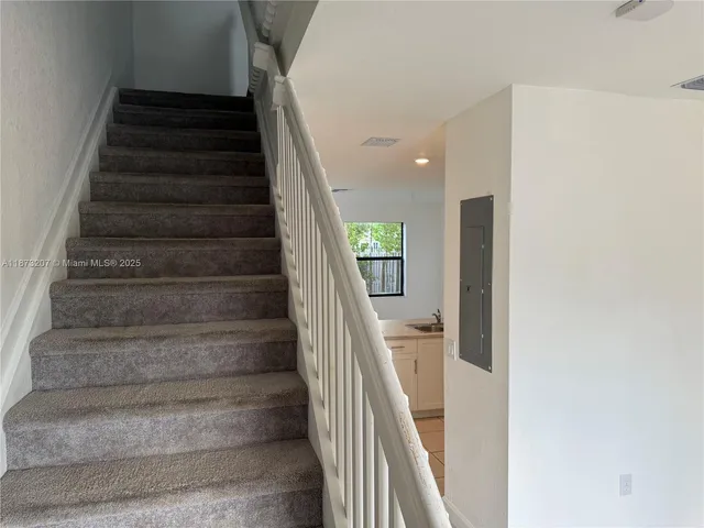 a view of an entryway with staircase