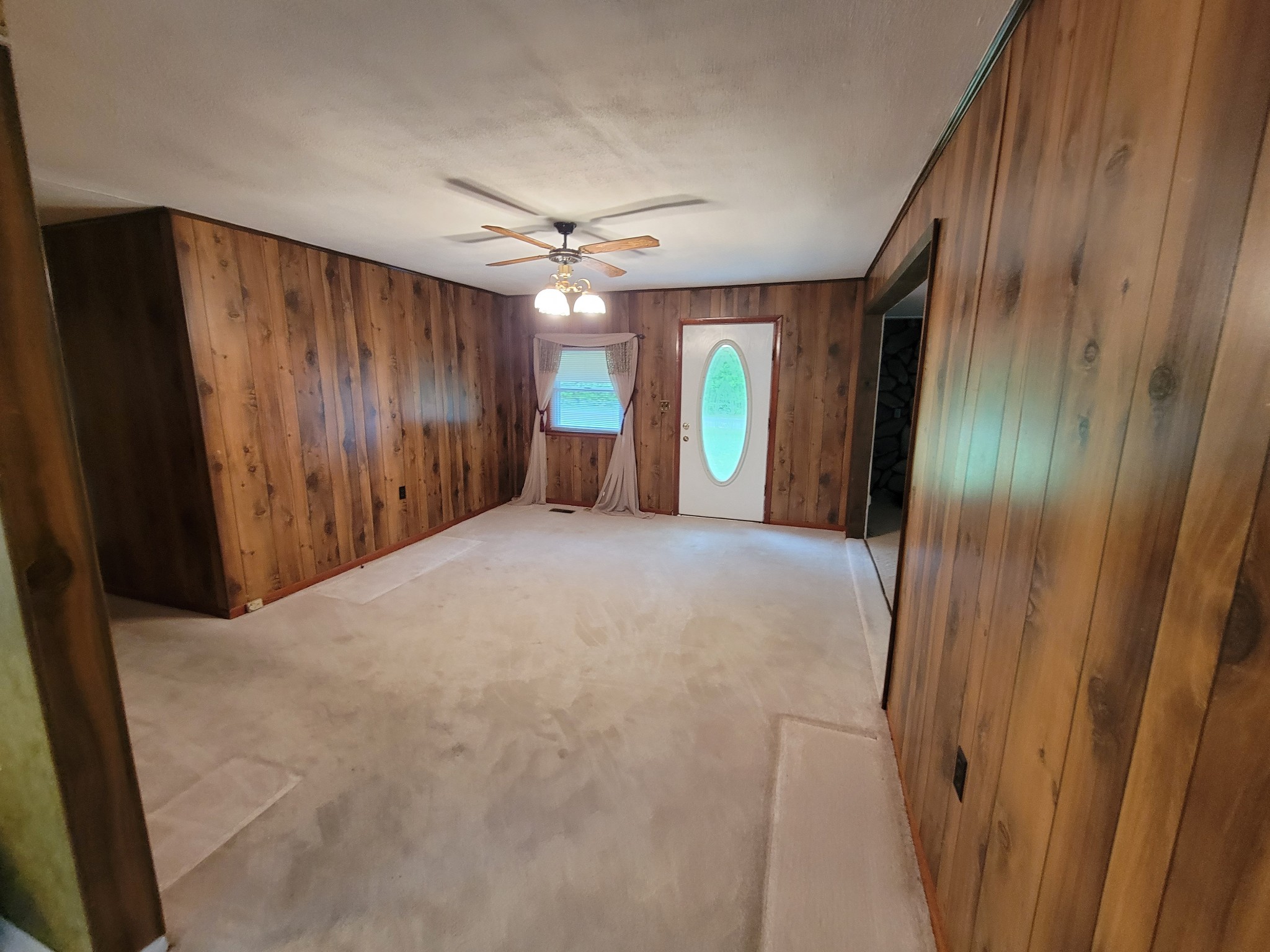 132 Gruett Road Manchester, TN 37355 - Photo 12 of 36 a view of a hallway with a chandelier