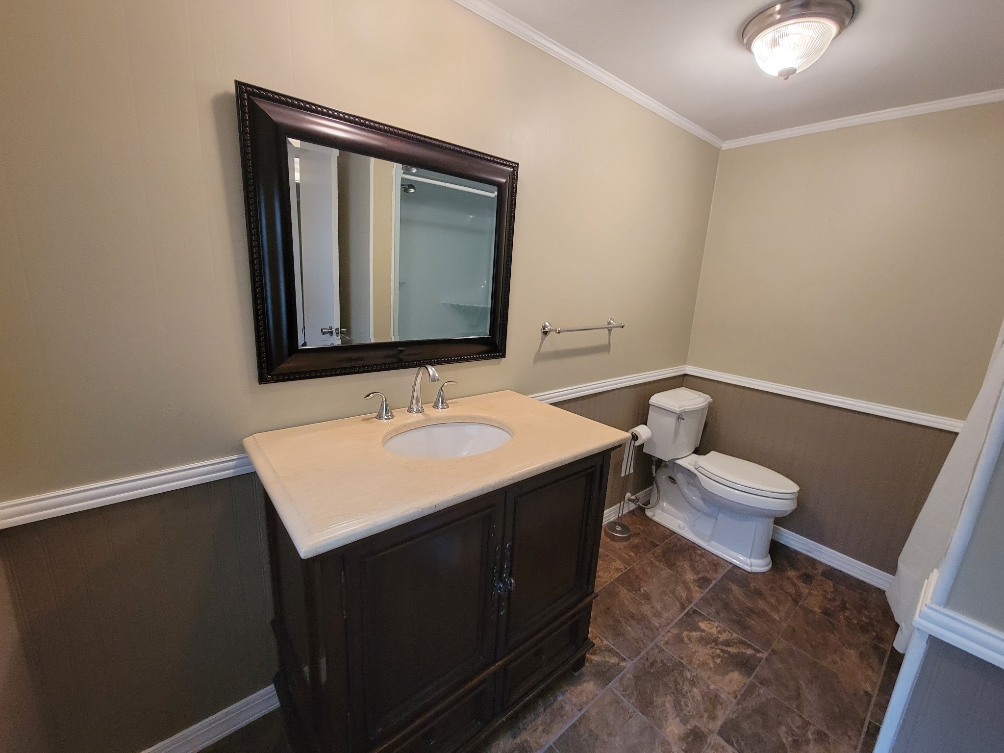 132 Gruett Road Manchester, TN 37355 - Photo 18 of 36 a bathroom with a toilet sink and mirror