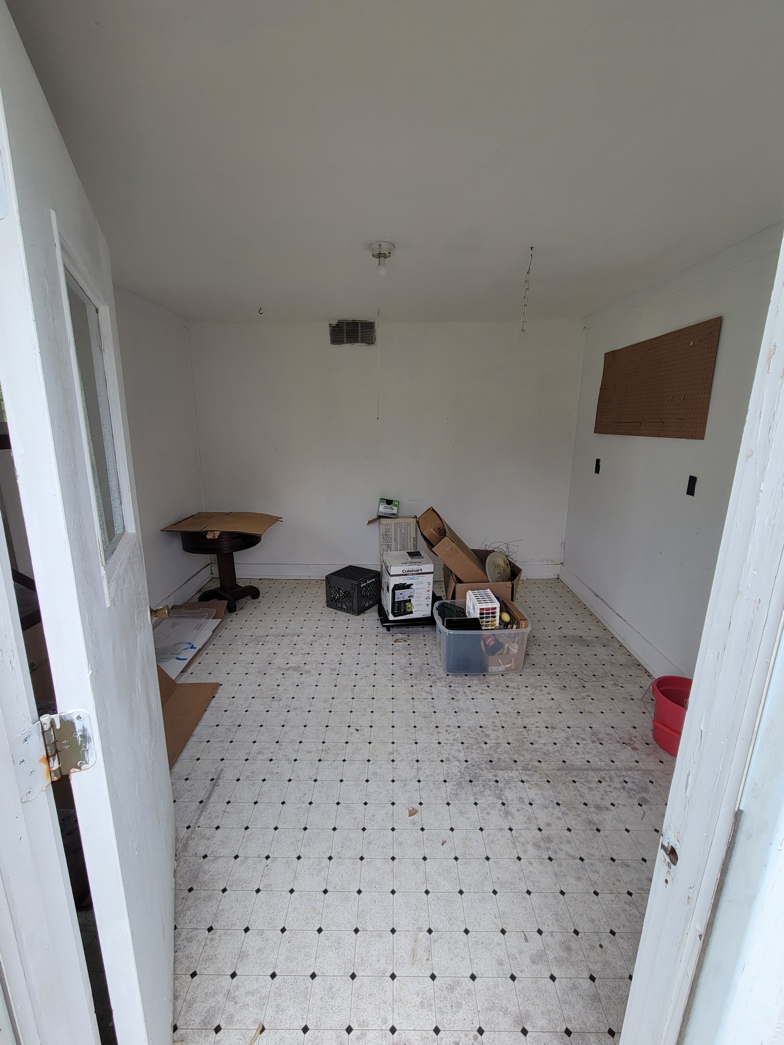 132 Gruett Road Manchester, TN 37355 - Photo 26 of 36 a room with a couch and a walk in closet with wooden floor