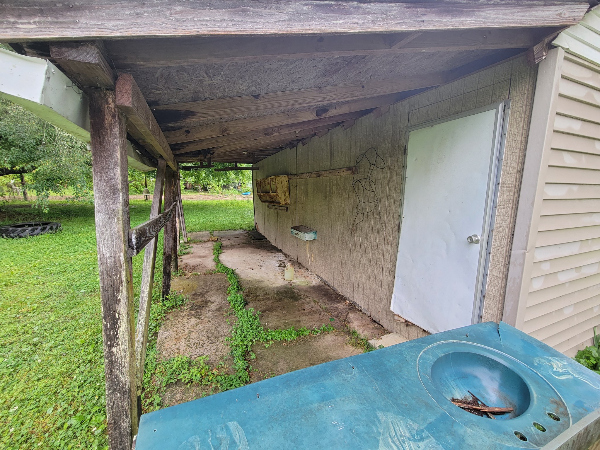 132 Gruett Road Manchester, TN 37355 - Photo 30 of 36 a backyard of a house with seating space