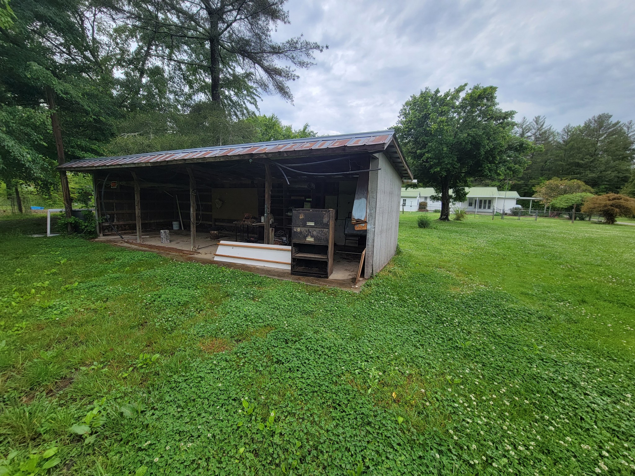 132 Gruett Road Manchester, TN 37355 - Photo 31 of 36 a view of a house with a yard and sitting area