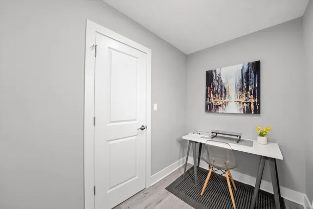 a workspace with furniture and window