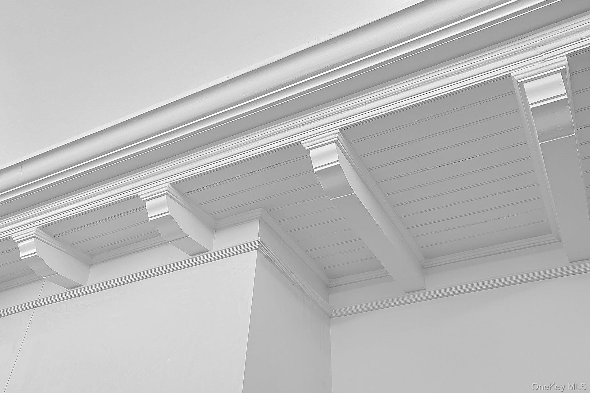 20 Nazareth Way Cold Spring, NY 10516 - Photo 17 of 50 The detail on the molding throughout this room has to be seen in person to be truly appreciated. This level of skill, pride in craftsmanship (and these material), are nearly impossible to come buy today. Where else will you find this? Also in this room is another fireplace.