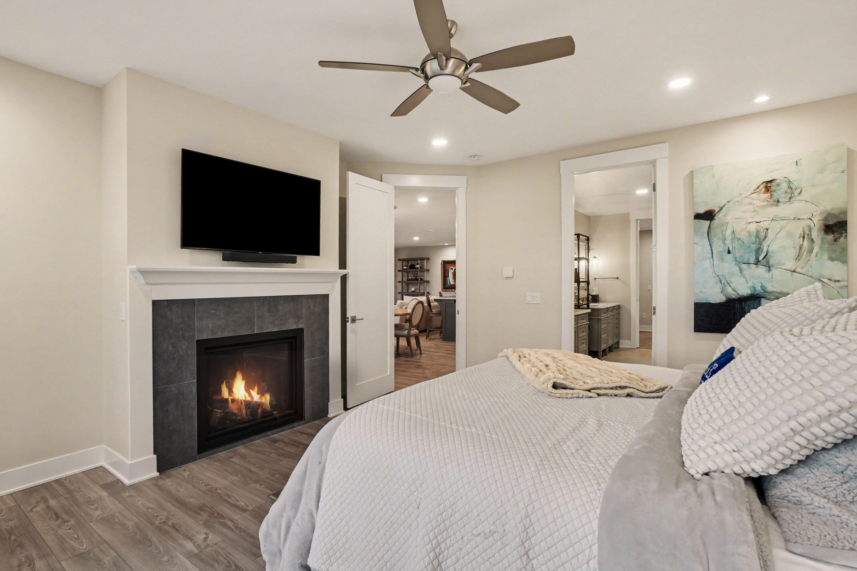 2031 Ottawa Beach Road Holland, MI 49424 - Photo 13 of 29 PRIMARY SUITE EVENING LIGHTING