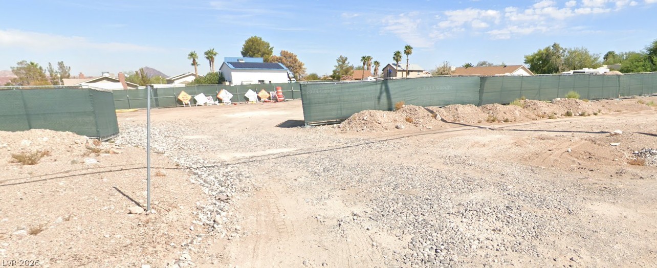 Ithaca Avenue Henderson, NV 89015 - Photo 2 of 3 A spacious, level lot awaits your vision, ready for new construction.