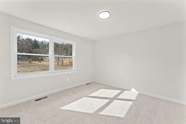 an empty room with a window