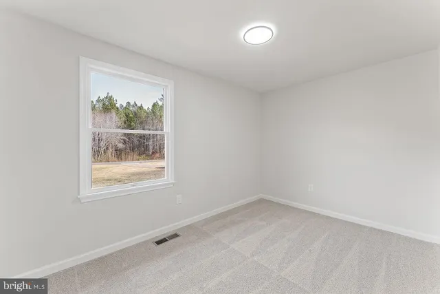 an empty room with a window