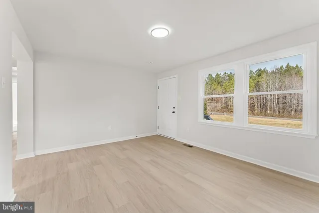 an empty room with windows