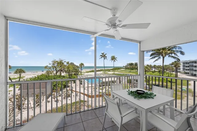 a view of a balcony with furniture