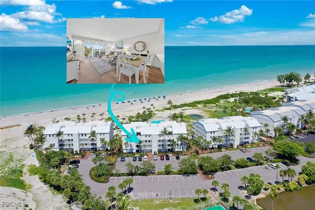 an aerial view of a building with outdoor space