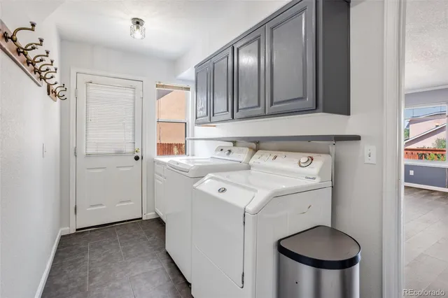 a kitchen with a sink and a stove