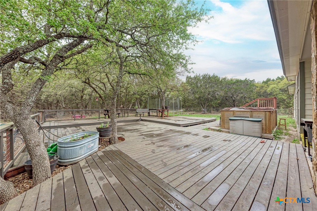 1325 County Road 106 Lampasas, TX 76550 - Photo 40 of 48 a view of a terrace with wooden floor and outdoor seating