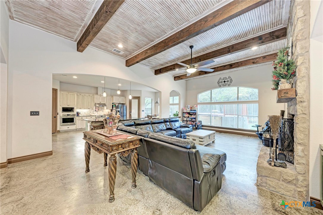 1325 County Road 106 Lampasas, TX 76550 - Photo 6 of 48 a living room with stainless steel appliances granite countertop furniture and a kitchen view