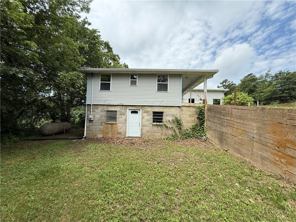 4250 AR 7 Jasper, AR 72641 - Photo 24 of 47 Two-story residence featuring light gray siding and a concrete block foundation
