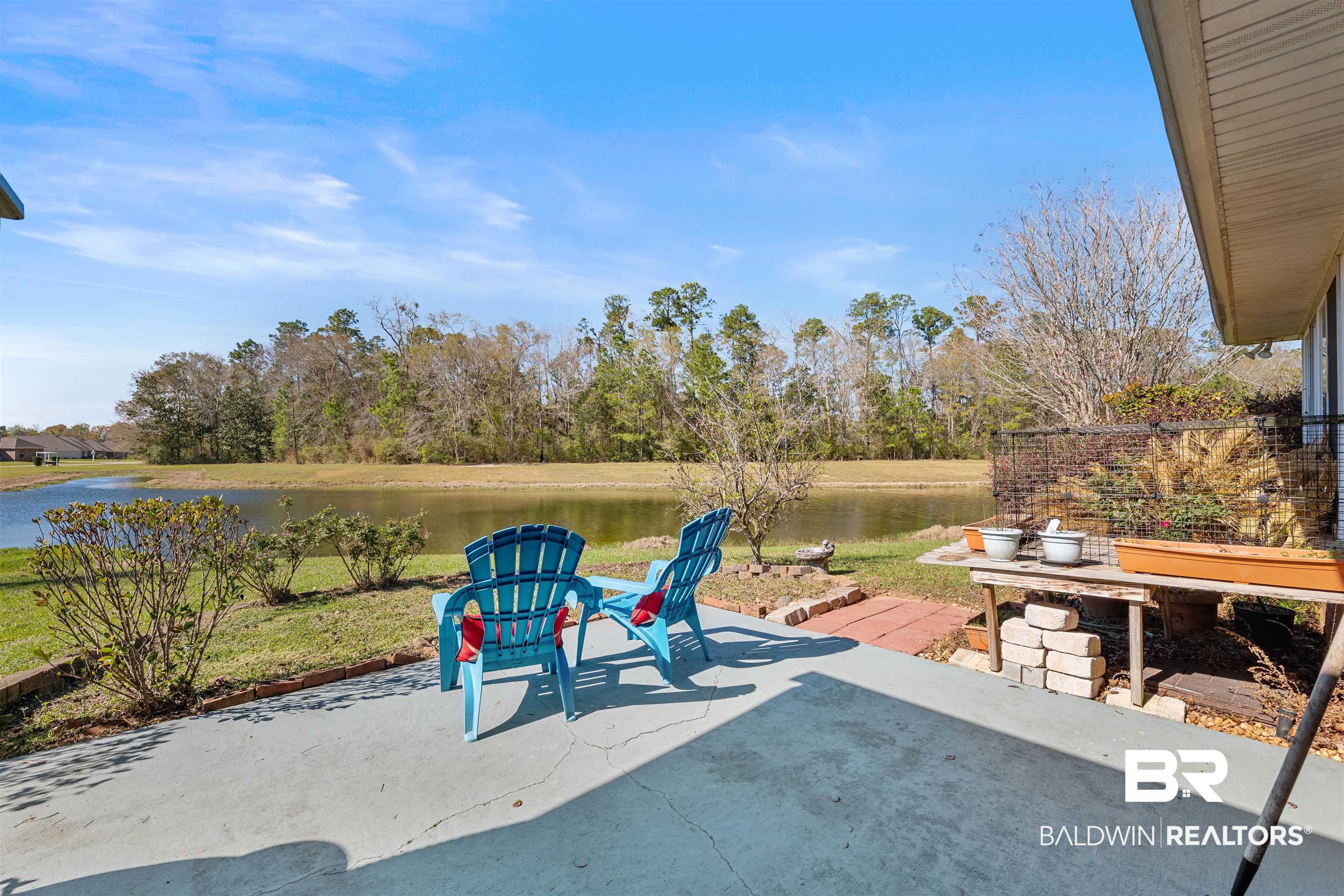 237 Hemingway Loop Foley, AL 36535 - Photo 24 of 49 View of patio with a water view