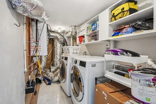 a utility room with dryer and washer
