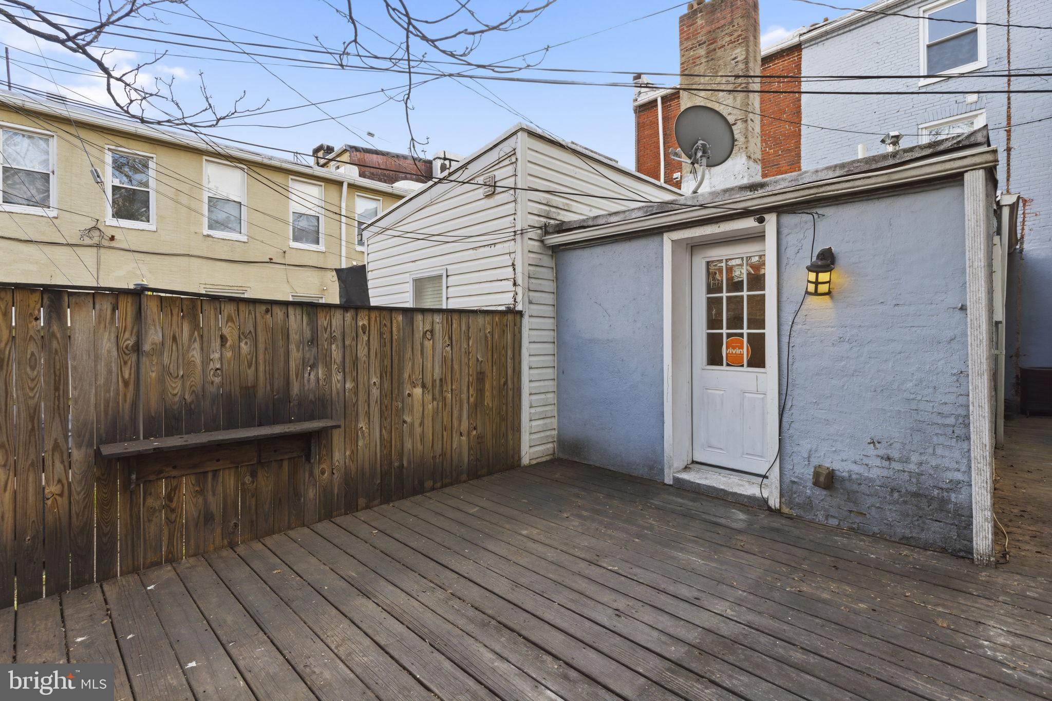 513 Scott Street Baltimore, MD 21230 - Photo 12 of 14 a view of a house with wooden deck