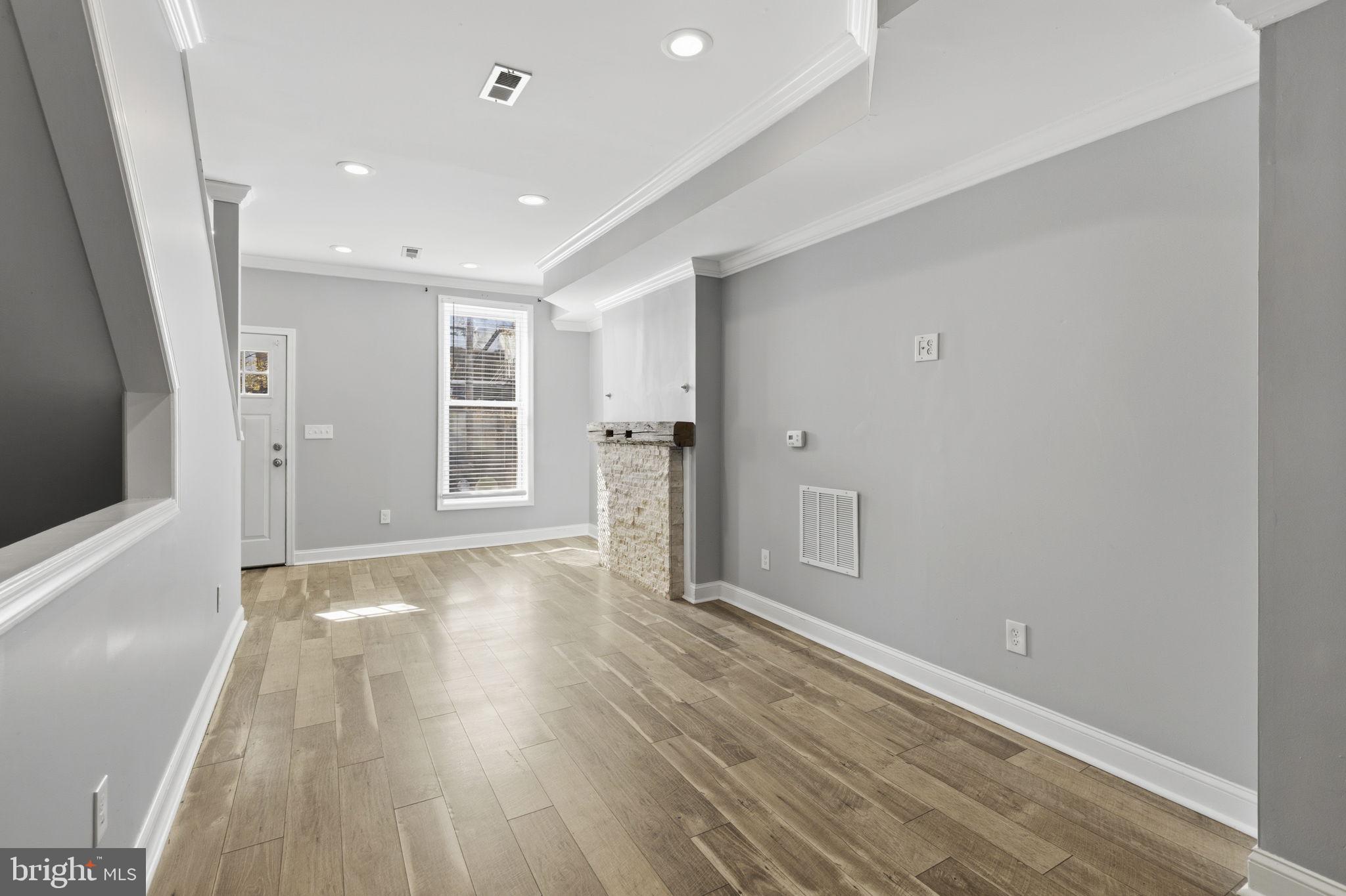 513 Scott Street Baltimore, MD 21230 - Photo 3 of 14 wooden floor in an empty room with wooden floor