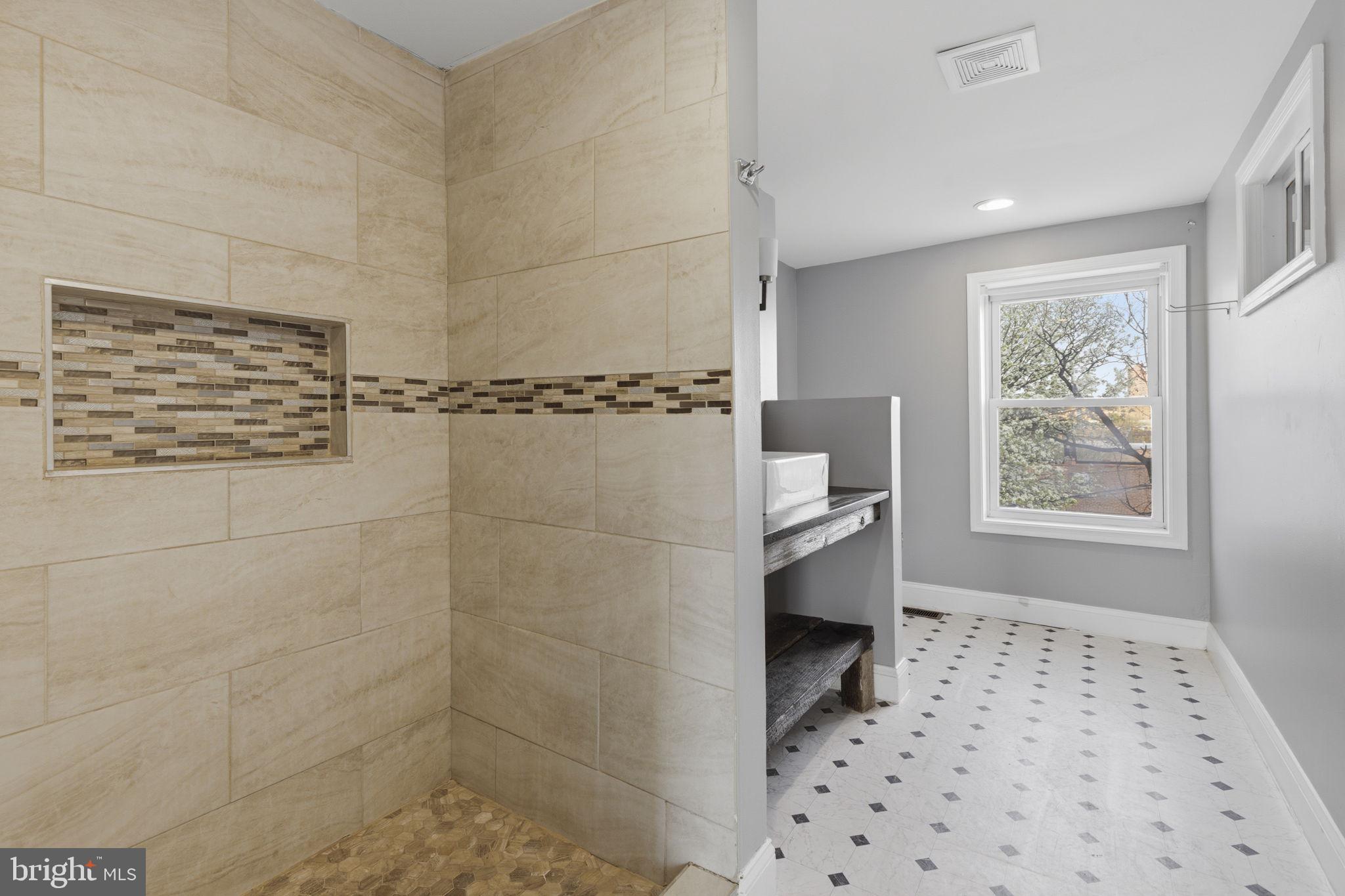 513 Scott Street Baltimore, MD 21230 - Photo 8 of 14 a bathroom with a shower