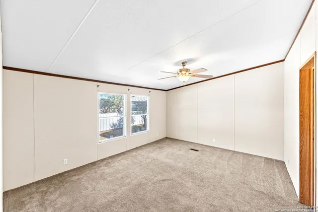 an empty room with windows