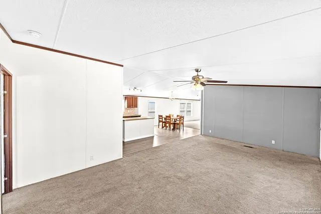 a view of a storage & utility room with a sink