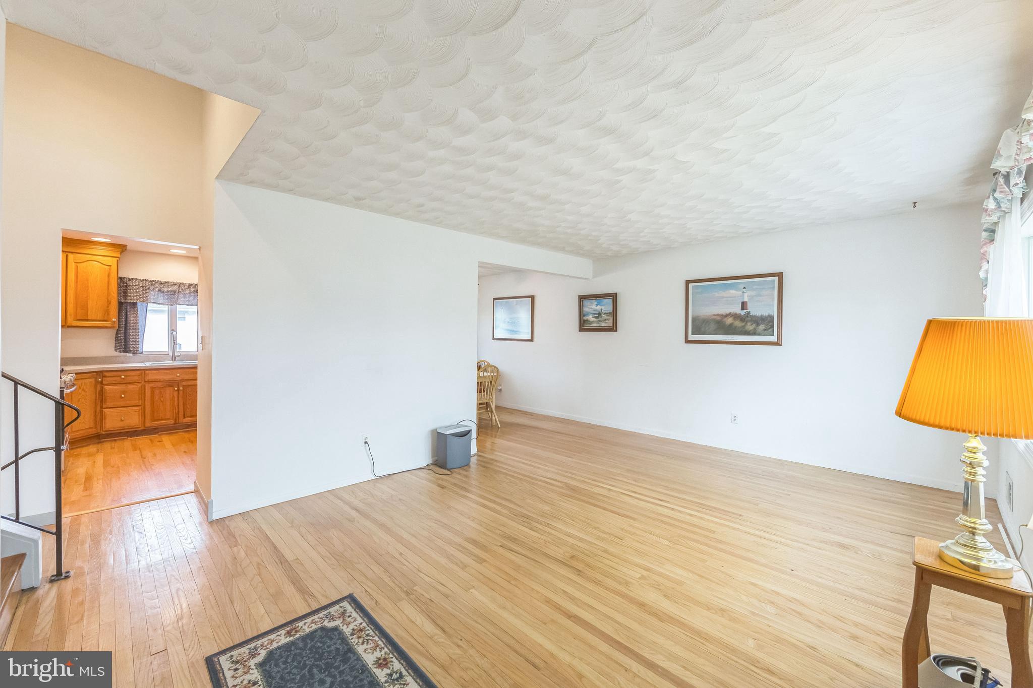 864 Estates Boulevard Hamilton, NJ 08690 - Photo 5 of 15 a view of empty room with wooden floor