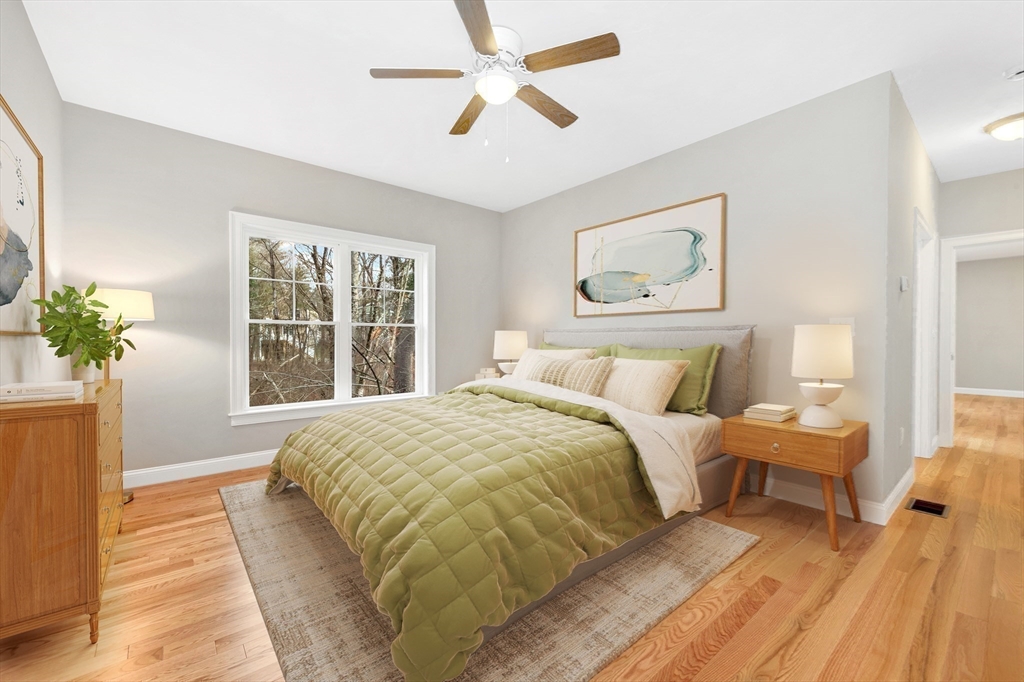 29 Willow Pond Circle, Unit 29 Medway, MA 02053 - Photo 20 of 38 a spacious bedroom with a bed and a window