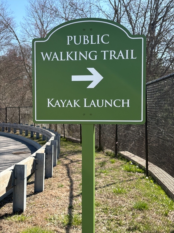 29 Willow Pond Circle, Unit 29 Medway, MA 02053 - Photo 36 of 38 a sign broad on the side of the road