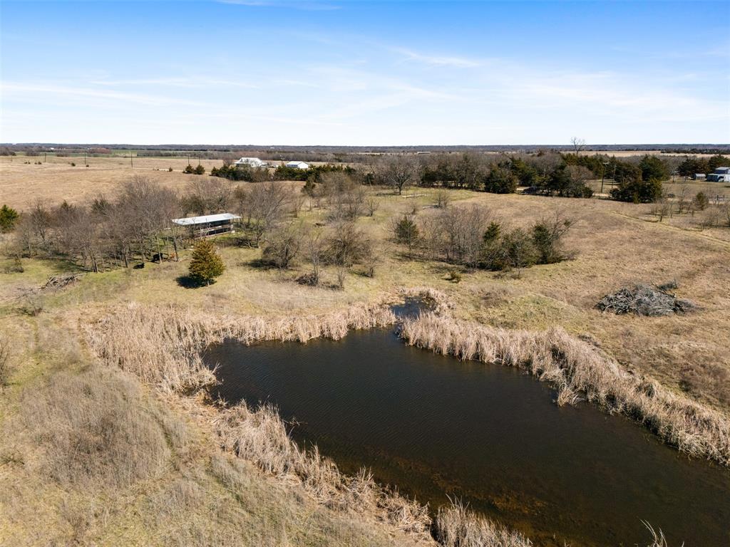 26100 Co Road Petty, TX 75470 - Photo 16 of 26 a view of a lake with a city