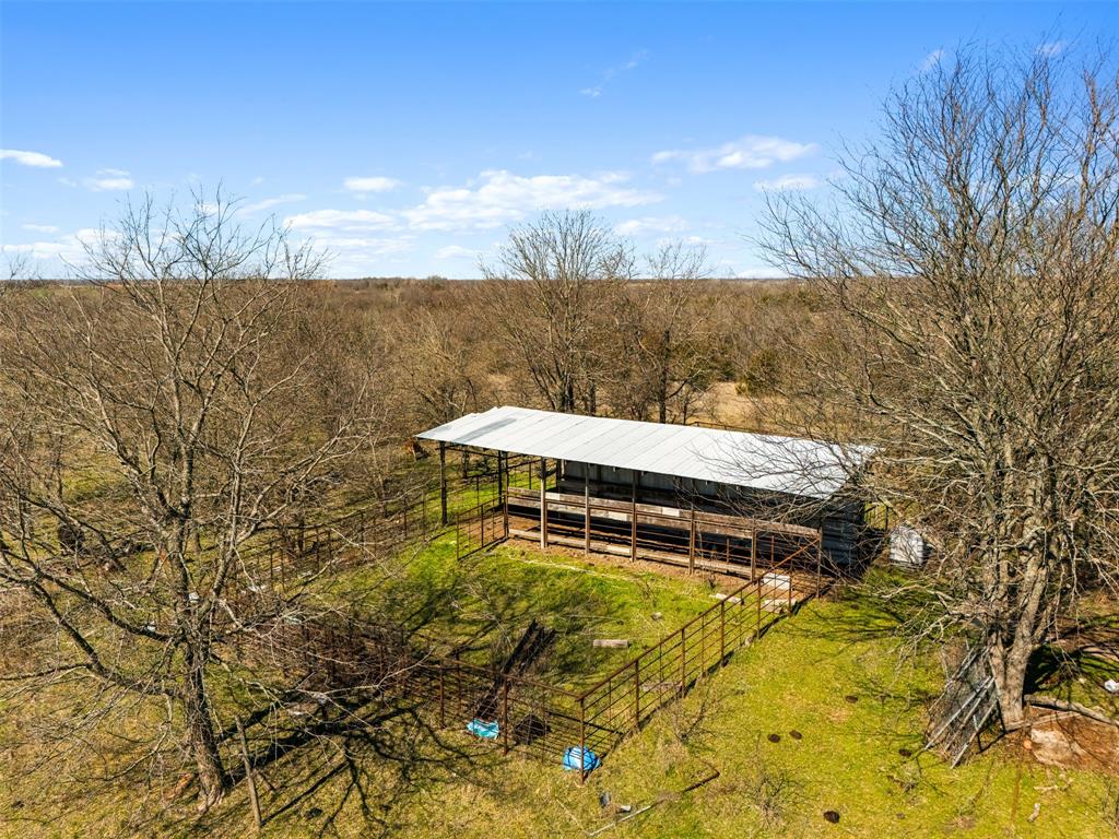 26100 Co Road Petty, TX 75470 - Photo 5 of 26 a view of a lake with a yard