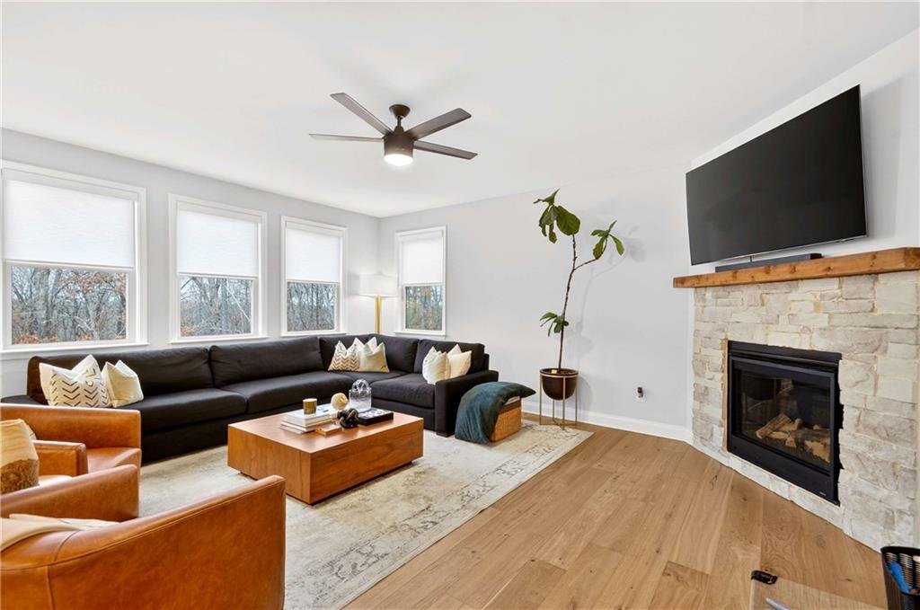 3481 Jasmine Way Atlanta, GA 30331 - Photo 17 of 41 a living room with furniture a flat screen tv and a fireplace