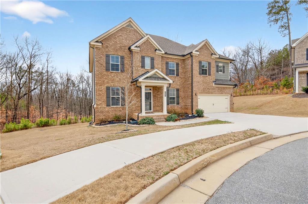3481 Jasmine Way Atlanta, GA 30331 - Photo 2 of 41 a front view of a house with a yard
