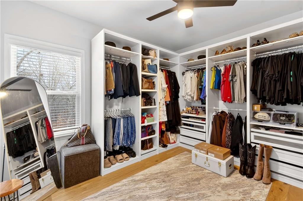 3481 Jasmine Way Atlanta, GA 30331 - Photo 26 of 41 a view of walk in closet with clothes and shoes