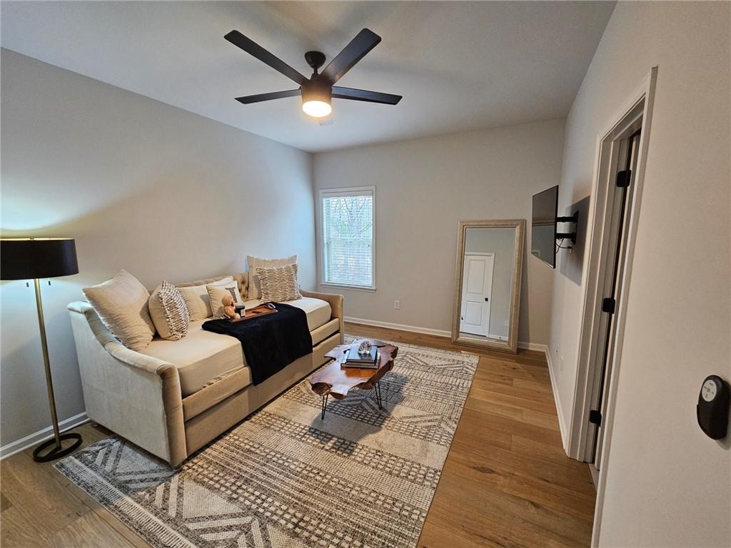 3481 Jasmine Way Atlanta, GA 30331 - Photo 29 of 41 a bedroom with a bed rug and a large mirror