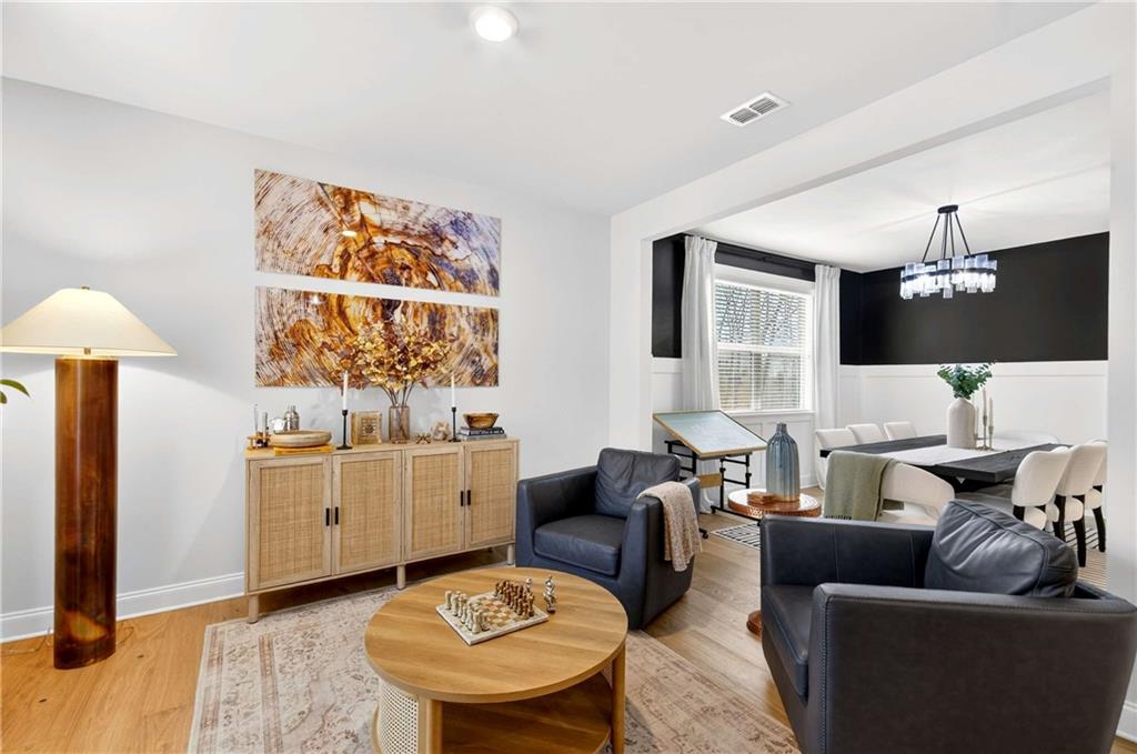 3481 Jasmine Way Atlanta, GA 30331 - Photo 6 of 41 a living room with furniture and a flat screen tv
