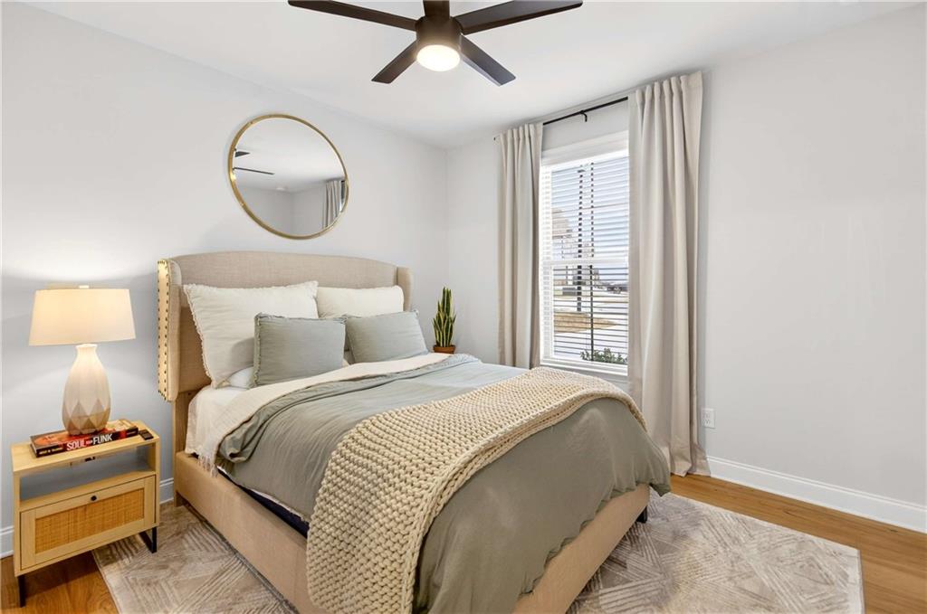 3481 Jasmine Way Atlanta, GA 30331 - Photo 9 of 41 a bed room with a bed mirror and a window
