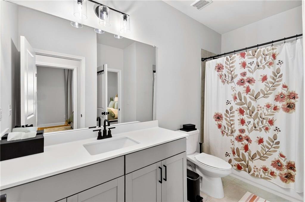 3481 Jasmine Way Atlanta, GA 30331 - Photo 10 of 41 a bathroom with a sink and a mirror