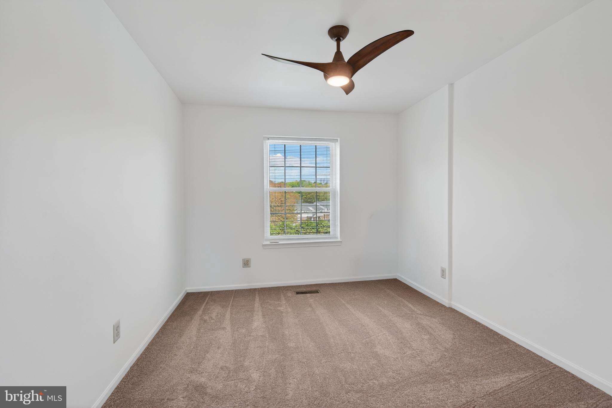 122 Longford Road West Chester, PA 19380 - Photo 27 of 39 an empty room with a window