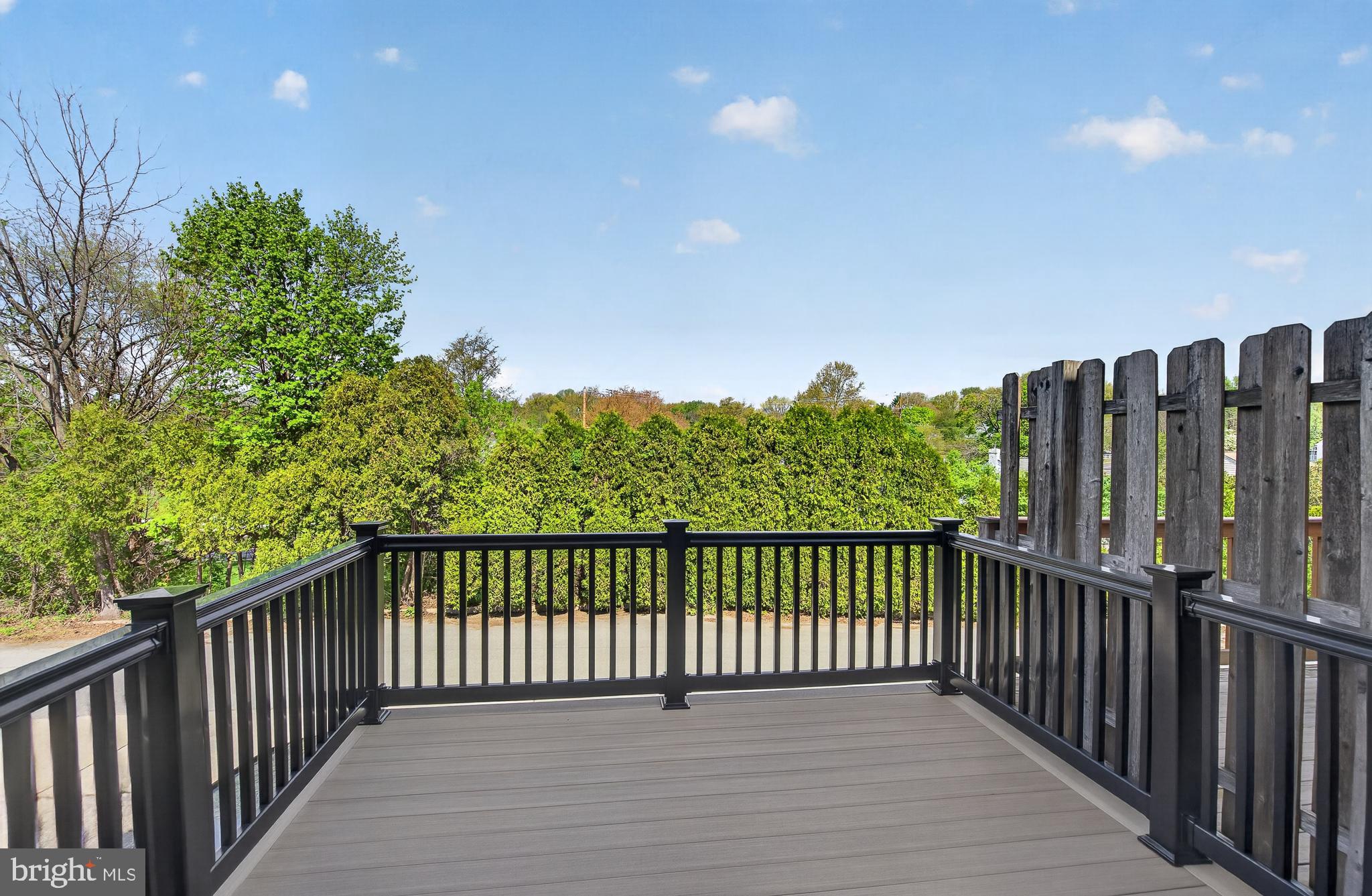 122 Longford Road West Chester, PA 19380 - Photo 29 of 39 a view of a balcony with wooden floor and fence
