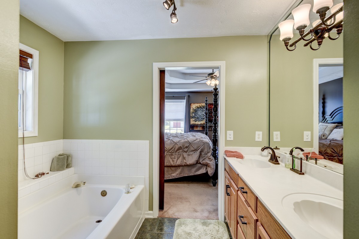 3011 Tyree Springs Road Hendersonville, TN 37075 - Photo 19 of 43 a en suite spacious bathroom with a tub sink and mirror