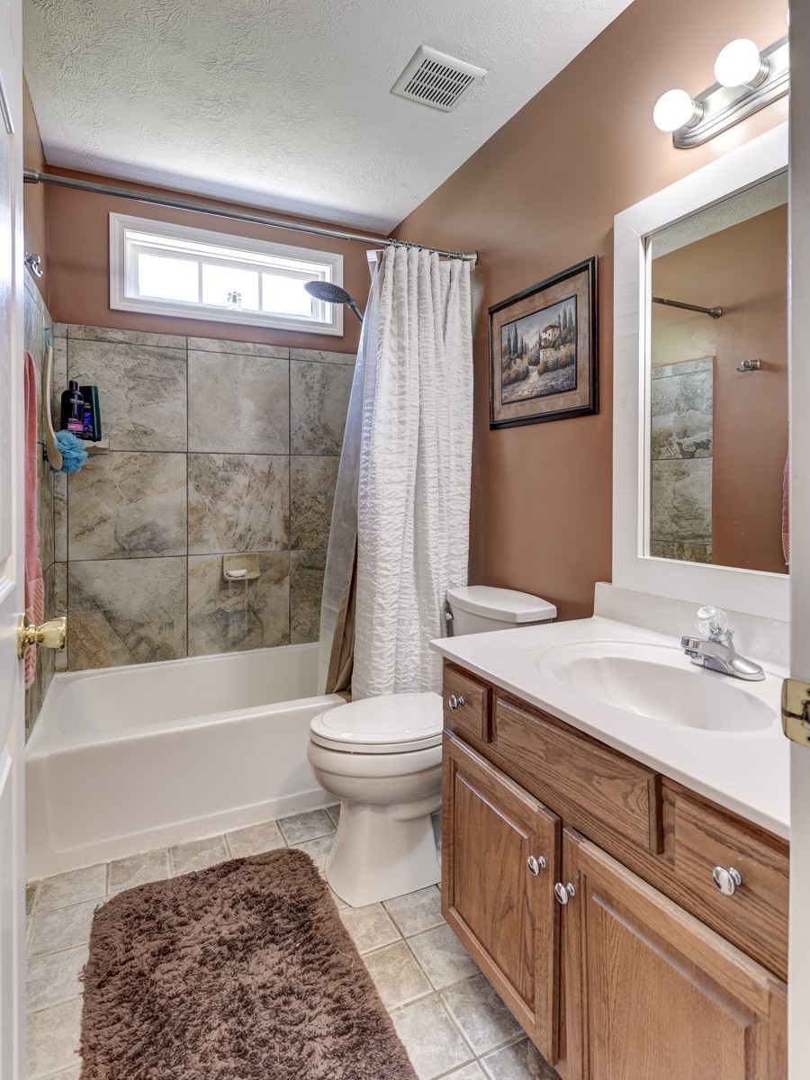 3011 Tyree Springs Road Hendersonville, TN 37075 - Photo 23 of 43 a bathroom with a sink toilet and shower