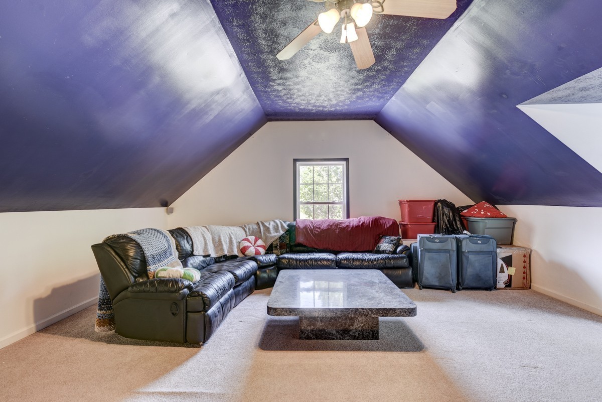 3011 Tyree Springs Road Hendersonville, TN 37075 - Photo 26 of 43 a living room with furniture and a chandelier