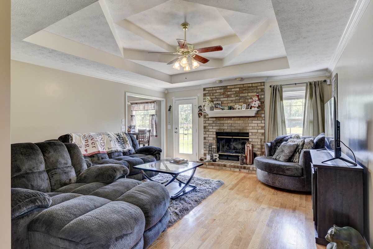 3011 Tyree Springs Road Hendersonville, TN 37075 - Photo 4 of 43 a living room with furniture a fireplace and a large window